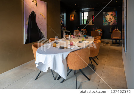 Chic setting with elegant decor. Sophisticated space featuring stylish furnishings and lighting 137462575