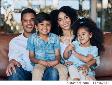 Happy, portrait and relax with family on sofa for smile, bonding and peace on holiday. Love, care and happiness with parents and children in living room at home for vacation, cuddle and embrace Happy, portrait and relax with family on sofa for smile, bonding and peace on holiday. Love, care and happiness with parents and children in living room at home for vacation, cuddle and embrace 137462612