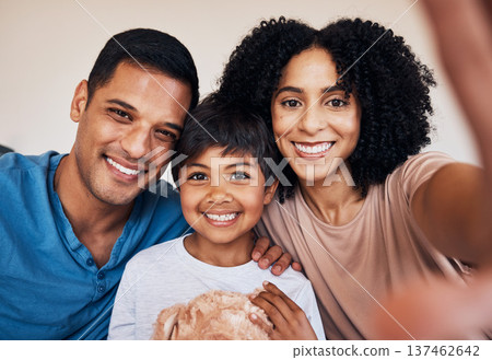 Family, parents and child, happiness and selfie, bonding with memory at home, love and trust with care. Smile in picture, social media and mother, father and kid relax with photography and post Family, parents and child, happiness and selfie, bonding with memory at home, love and trust with care. Smile in picture, social media and mother, father and kid relax with photography and post 137462642