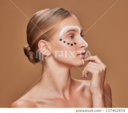 Face paint, woman and profile with skincare, dermatology and creative art in studio. Beauty, thinking and makeup with unique artwork and cosmetics with wellness of model with brown background 137462659