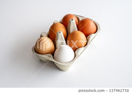 Eco Farm Fresh Eggs in Carton on White Background 137462738