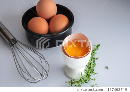 Organic Eggs with Cracked Egg Close-Up Organic Eggs with Cracked Egg Close-Up 137462749