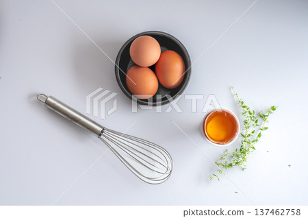 Fresh Eggs in Black Bowl on White Kitchen Counter Fresh Eggs in Black Bowl on White Kitchen Counter 137462758