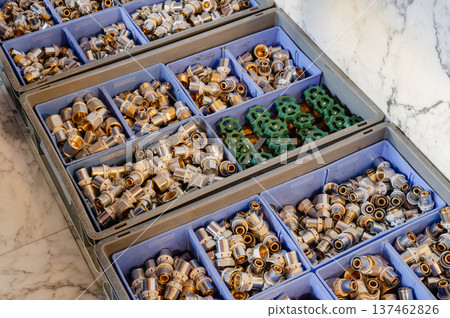 Plumbing Parts in Cardboard Boxes 137462826