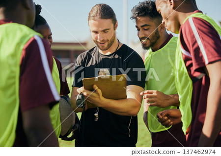 Sports strategy, talking and men in rugby for teamwork, fitness planning or training schedule. Together, field and diversity with group of athlete people with a coach for conversation about a game Sports strategy, talking and men in rugby for teamwork, fitness planning or training schedule. Together, field and diversity with group of athlete people with a coach for conversation about a game 137462974