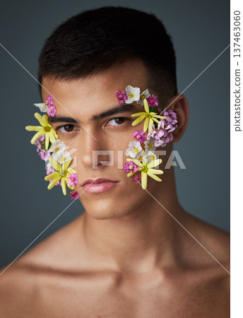 Portrait, man and flowers, beauty and natural, cosmetics and headshot with art deco isolated on studio background. Nature aesthetic, face and dermatology, eco friendly skincare and clean with spring 137463060