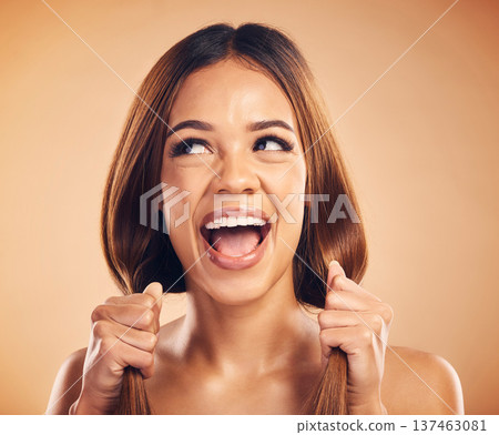 Face, happiness and woman with straight healthy hair, texture shine and strong extensions, volume or highlights. Salon studio, clean hairstyle and face of happy person scream on brown background Face, happiness and woman with straight healthy hair, texture shine and strong extensions, volume or highlights. Salon studio, clean hairstyle and face of happy person scream on brown background 137463081
