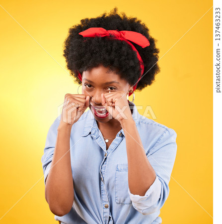 Fashion, fight and boxing with portrait of black woman in studio for power, motivation and energy. Empowerment, pride and champion with person and fist on yellow background for challenge and strong 137463233