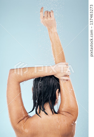 Shower, studio and woman cleaning back, hair or body for wellness on mock up space on blue background. Fresh, water or wet person washing and grooming for healthy natural hygiene or skincare to relax 137463273