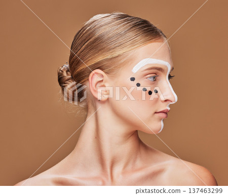 Art, cosmetic and young woman in studio with creative, beauty and abstract face aesthetic. Makeup, artistic and headshot of gen z female model from Australia with facial paint by brown background. 137463299