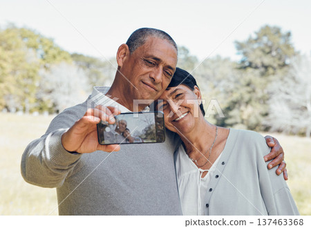 Hug, selfie or old couple in park with love, smile or support with romance, bonding or marriage together. Photograph, old man or elderly woman taking pictures in retirement with happiness together Hug, selfie or old couple in park with love, smile or support with romance, bonding or marriage together. Photograph, old man or elderly woman taking pictures in retirement with happiness together 137463368