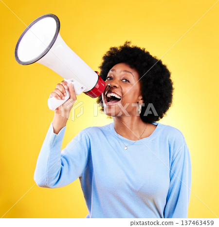 Happy black woman, megaphone and speaker in advertising or marketing against a yellow studio background. African female person, smile or voice with loudspeaker in announcement, alert or discount sale Happy black woman, megaphone and speaker in advertising or marketing against a yellow studio background. African female person, smile or voice with loudspeaker in announcement, alert or discount sale 137463459
