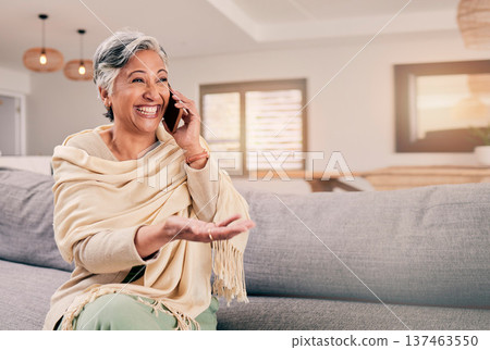 Phone call, happy senior woman and living room with conversation and communication in a home. Retirement, elderly female person and mobile discussion on a lounge sofa with contact and chat on couch 137463550