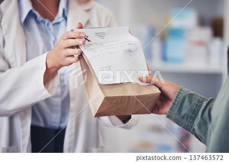 Pharmacy, hands and prescription medicine for customer with paper bag for healthcare, drugs and pharmaceutical. Closeup of a pharmacist or medical worker with person in drugstore for retail service 137463572