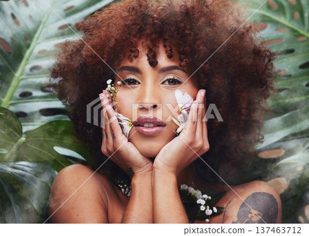 Flowers, beauty and portrait of black woman with skincare, cosmetics and creative or eco friendly art in nature or forest. Natural, face and model with flower makeup and healthy or organic skin care Flowers, beauty and portrait of black woman with skincare, cosmetics and creative or eco friendly art in nature or forest. Natural, face and model with flower makeup and healthy or organic skin care 137463712