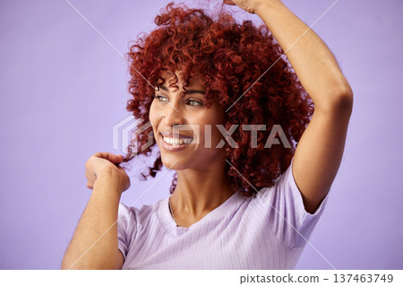 Black woman, hair care and face with smile, natural afro and growth for glow and shine in studio on purple background. Wellness, person and healthy texture of cream and argon oil cosmetics indoor Black woman, hair care and face with smile, natural afro and growth for glow and shine in studio on purple background. Wellness, person and healthy texture of cream and argon oil cosmetics indoor 137463749