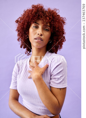 Serious, portrait and African woman with fashion, natural beauty and gen z confidence on purple background in studio. Dermatology, face and model with pride, style and pose for cosmetics or skincare Serious, portrait and African woman with fashion, natural beauty and gen z confidence on purple background in studio. Dermatology, face and model with pride, style and pose for cosmetics or skincare 137463769