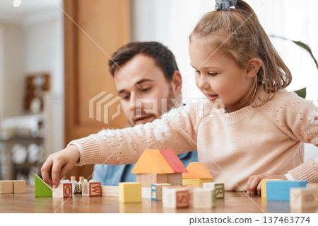 Building blocks, toys and girl playing with dad in living room for education, development and learning through creative games. Montessori, child and father bonding with kid in family home lounge Building blocks, toys and girl playing with dad in living room for education, development and learning through creative games. Montessori, child and father bonding with kid in family home lounge 137463774
