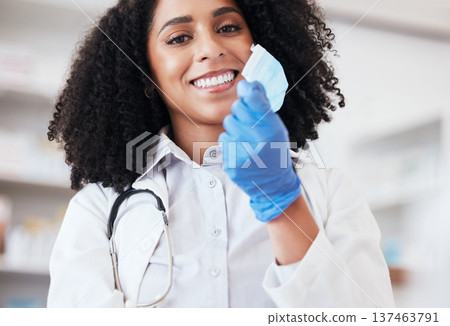 Healthcare, portrait and doctor remove mask or medical worker with freedom, safety or smile. African person career in medicine with facial ppe for virus end, protection or professional hospital care 137463791