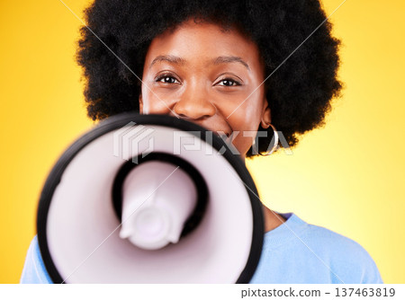 Happy black woman, portrait and megaphone in advertising or marketing against a yellow studio background. African female person, smile or voice and loudspeaker in announcement, alert or discount sale 137463819