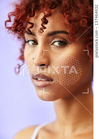Portrait, beauty and skin technology for pigment with a woman in studio on a purple background closeup. Face, skincare and rendering with a young model scanning her cheek for plastic surgery Portrait, beauty and skin technology for pigment with a woman in studio on a purple background closeup. Face, skincare and rendering with a young model scanning her cheek for plastic surgery 137464032