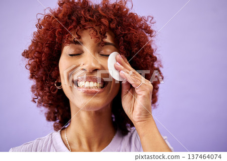 Skincare, swab and happy woman in studio for cleaning, wellness or cosmetic on purple background. Beauty, smile and lady model with facial cotton for toner, cleanse or face pad for makeup application 137464074