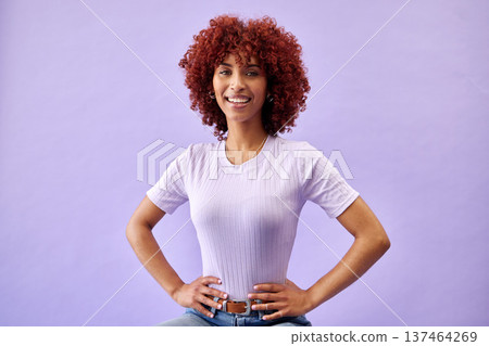 African woman, smile and portrait for fashion with confidence, pride and smile on purple background in studio. Happy, face and natural collagen cosmetics for afro or dermatology skincare in salon African woman, smile and portrait for fashion with confidence, pride and smile on purple background in studio. Happy, face and natural collagen cosmetics for afro or dermatology skincare in salon 137464269