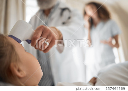 Sick, thermometer and doctor with child in bedroom for consulting, virus and medical checkup. Healthcare, helping and fever results with people in family home for inspection, wellness and exam 137464369