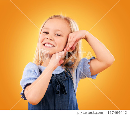 Smile, cute and portrait of a child on a studio background for youth, happiness or expression. Orange, young and face of a girl kid or female model with a gesture for adorable, positive or childhood Smile, cute and portrait of a child on a studio background for youth, happiness or expression. Orange, young and face of a girl kid or female model with a gesture for adorable, positive or childhood 137464442