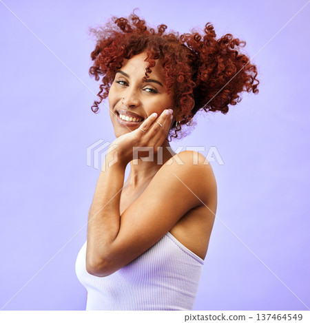 Hand on face, natural beauty and woman, hair care and wellness with smile isolated on purple background. Dermatology, haircare and cosmetics, portrait with red curls and skin glow in a studio Hand on face, natural beauty and woman, hair care and wellness with smile isolated on purple background. Dermatology, haircare and cosmetics, portrait with red curls and skin glow in a studio 137464549