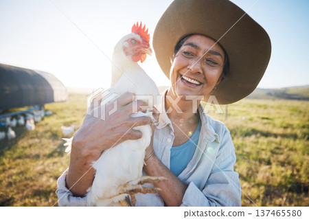 Chicken, woman and smile in field, nature, countryside for farming, agriculture and sustainability. Agro industry, female and happy in outdoor environment holding livestock for growth and production Chicken, woman and smile in field, nature, countryside for farming, agriculture and sustainability. Agro industry, female and happy in outdoor environment holding livestock for growth and production 137465580