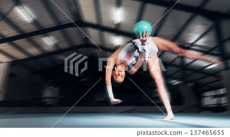 Gymnast, jump and ball with woman and sports, fitness and routine, performance with motion blur. Training, athlete and talent with creativity, movement and competition for gymnastics in an arena Gymnast, jump and ball with woman and sports, fitness and routine, performance with motion blur. Training, athlete and talent with creativity, movement and competition for gymnastics in an arena 137465655