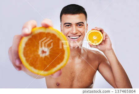 Happy man, portrait and orange in vitamin C, diet or skincare against a white studio background. Male person or model smile with organic citrus fruit for natural nutrition, health and wellness Happy man, portrait and orange in vitamin C, diet or skincare against a white studio background. Male person or model smile with organic citrus fruit for natural nutrition, health and wellness 137465804