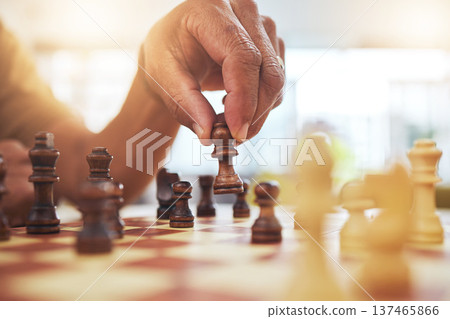 Person, chess and hands with pawn on board game for strategy, challenge and learning tabletop brain games. Closeup, chessboard and player moving pieces for winning contest, competition and fun hobby 137465866
