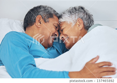 Bed, care and old couple with love, relax and marriage with retirement, relationship and romance. Morning, happy elderly man or senior woman with trust, bedroom and bonding with peace, home and smile Bed, care and old couple with love, relax and marriage with retirement, relationship and romance. Morning, happy elderly man or senior woman with trust, bedroom and bonding with peace, home and smile 137465892