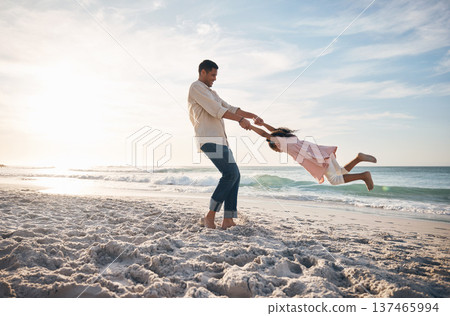 Beach, swing and father with girl child at ocean for travel, fun and bond in nature together. Freedom, celebration and parent holding hands with kid at sea happy, adventure and journey on summer trip Beach, swing and father with girl child at ocean for travel, fun and bond in nature together. Freedom, celebration and parent holding hands with kid at sea happy, adventure and journey on summer trip 137465994