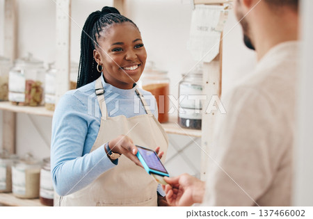 Sustainable shop, woman payment and credit card with store and electronic transaction with small business. Worker smile, entrepreneur and happy African person with retail employee and shopping pay Sustainable shop, woman payment and credit card with store and electronic transaction with small business. Worker smile, entrepreneur and happy African person with retail employee and shopping pay 137466002