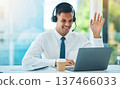 Call center, laptop and man wave in video in customer service, support or help desk office. Happy, hello and sales agent in webinar communication, consulting and telemarketing in online conference 137466033