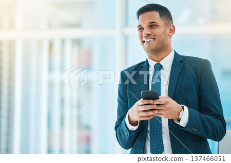 Phone, thinking and mockup with a business man in his office, typing a text message for communication. Mobile, idea and networking with a happy young employee chatting online in a corporate workplace 137466051