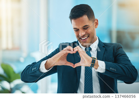Hands, heart and happy business man with love, care and kindness of like emoji in office. Corporate employee, smile and finger shape for thank you, trust and sign of hope, support and icon of peace Hands, heart and happy business man with love, care and kindness of like emoji in office. Corporate employee, smile and finger shape for thank you, trust and sign of hope, support and icon of peace 137466056