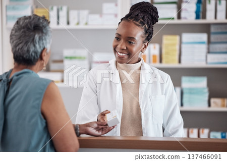 Pharmacist, pharmacy woman and customer for medicine service, healthcare advice and clinic solution or support by counter. African doctor or medical people with box for pills, product or retail drugs Pharmacist, pharmacy woman and customer for medicine service, healthcare advice and clinic solution or support by counter. African doctor or medical people with box for pills, product or retail drugs 137466091