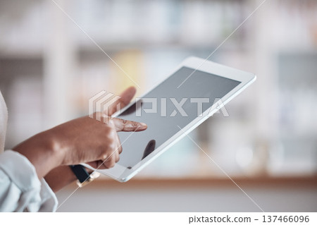 Woman pharmacist with tablet, typing in clinic and research for medical information, email or online chat. Digital app scroll, networking and doctor in pharmacy checking social media or internet news Woman pharmacist with tablet, typing in clinic and research for medical information, email or online chat. Digital app scroll, networking and doctor in pharmacy checking social media or internet news 137466096