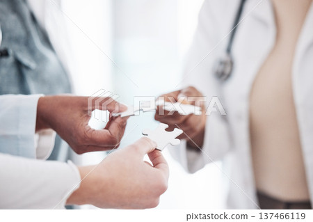 Doctor, team and hands with puzzle piece connection for solidarity, medical community and teamwork. Hospital, clinic and healthcare group with engagement, support and development of surgeon staff Doctor, team and hands with puzzle piece connection for solidarity, medical community and teamwork. Hospital, clinic and healthcare group with engagement, support and development of surgeon staff 137466119