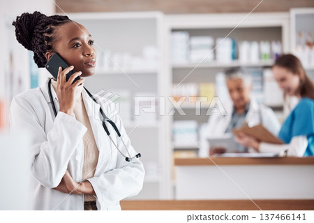 Pharmacist, medical or black woman on a phone call for medicine, customer service or healthcare support. Listening, doctor or African consultant talking or speaking of prescription or advice to help 137466141