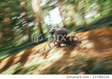 Bicycle, man and forest speed blur for workout outdoor in woods for healthy body. Mountain bike, nature and athlete training, cycling fast or off road adventure on journey, exercise or sport travel 137466226