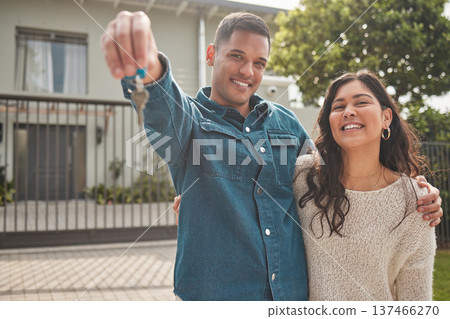 Happy couple, portrait and real estate with keys to new home in property investment together. Man and woman or homeowners smile for moving in, buying or building loan in asset, finance or investing 137466270