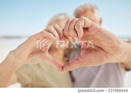 Heart, hands and closeup, love and support with health, couple outdoor in nature with travel and commitment. Trust, people at the beach with emoji, care and wellness sign, together with kindness 137466426