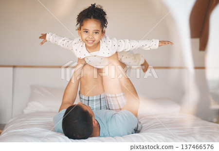 Kid, father and airplane games on bed for support or relax at home for crazy fun. Portrait, dad and happy girl child excited to fly in bedroom for freedom, fantasy and balance of play, care or energy Kid, father and airplane games on bed for support or relax at home for crazy fun. Portrait, dad and happy girl child excited to fly in bedroom for freedom, fantasy and balance of play, care or energy 137466576