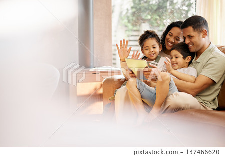 Tablet, video call and family with wave, love and smile on a living room sofa at home. Mother, dad and children together with online communication of parents and kids with discussion and mockup space Tablet, video call and family with wave, love and smile on a living room sofa at home. Mother, dad and children together with online communication of parents and kids with discussion and mockup space 137466620