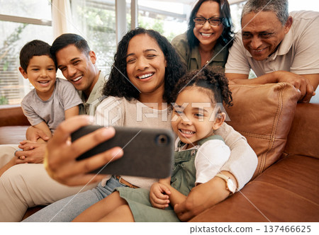 Big family, selfie and grandparents with children on sofa for holiday, love and relax together at home. Interracial people, mother and father with kids smile on couch for profile picture photography 137466625